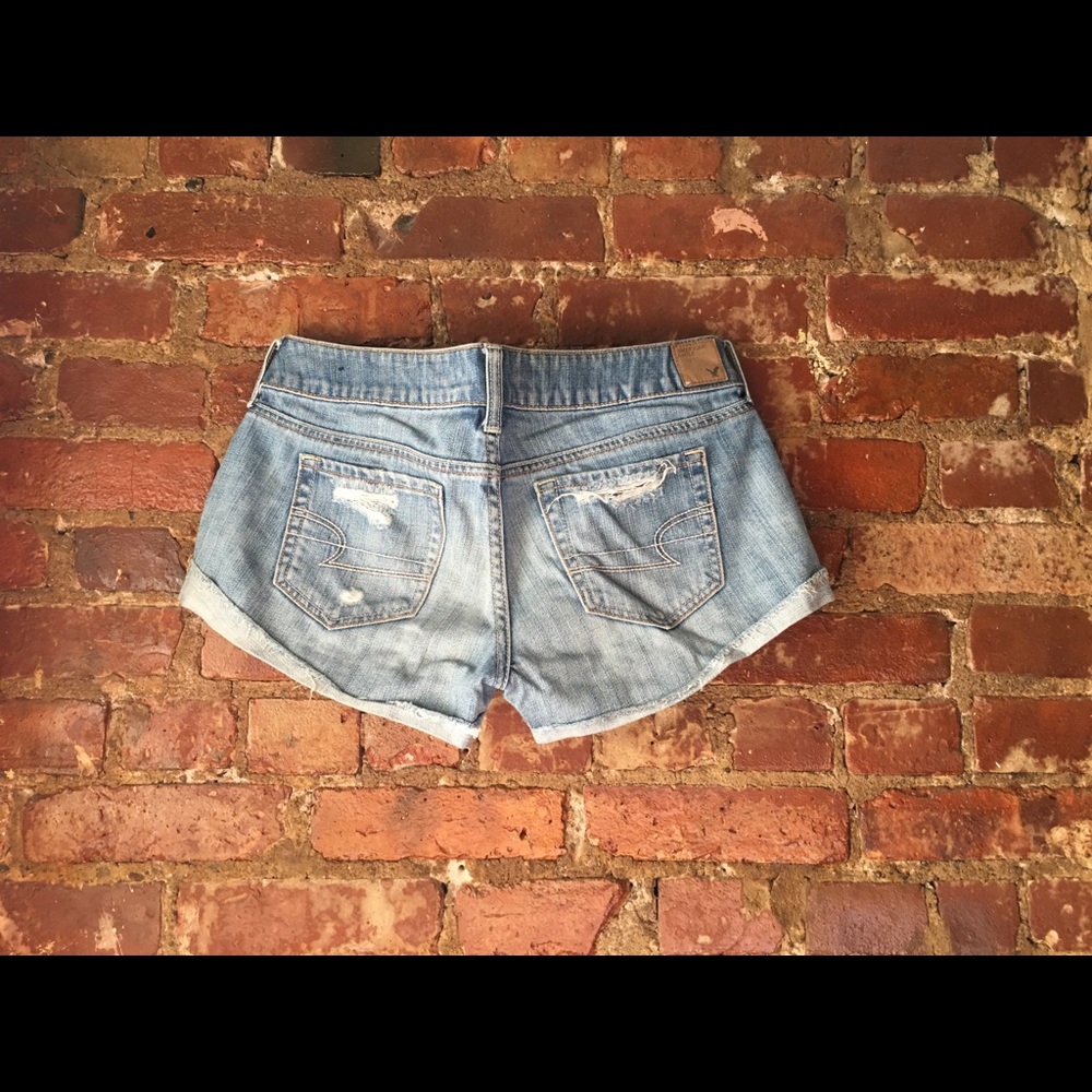 Distressed denim shorts